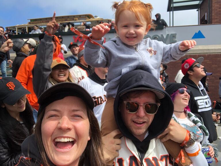 Our first summer together, Shawn turned Evan into a Giants fan! We still go to games several times a year with lots of friends and family.