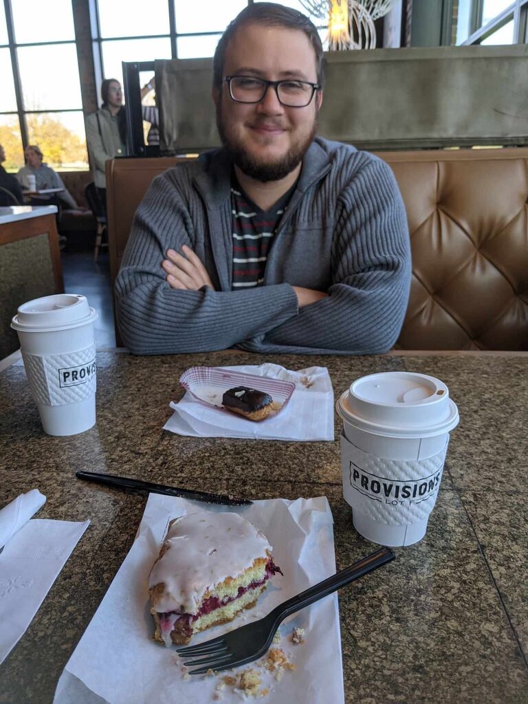 David and Becca have their first date at Provisions in Ames, IA. They met on Bumble while Becca was completing her clinical year at ISU College of Veterinary Medicine. It was supposed to be a coffee date, but they actually both got hot chocolate! 
(This photo was from when they revisited Provisions 2 years later - Becca would like it known that she is not weird enough to take a photo on a first date).