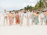 Beach wedding ceremony guests' attire