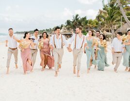 Beach wedding ceremony guests' attire