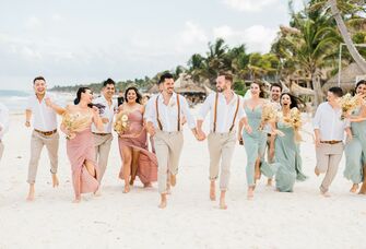 Beach wedding ceremony guests' attire