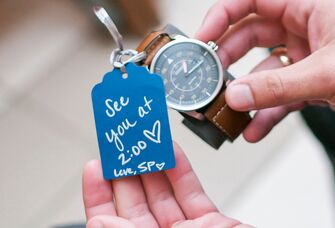 Traditional wedding gift for groom: watch with note