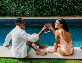 Couple enjoying wine by the pool, 222 relationship rule