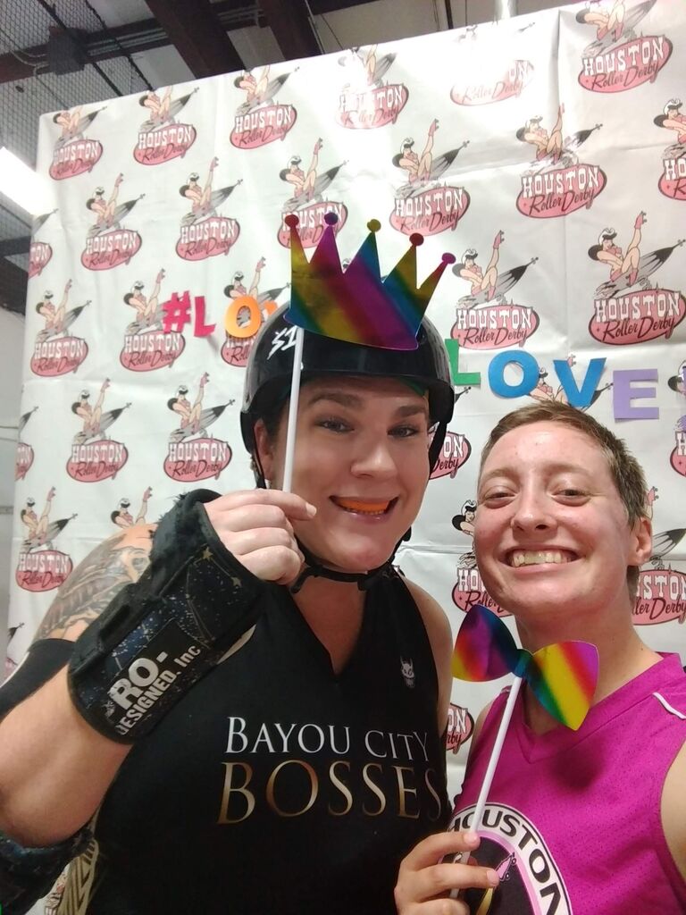 Celebrating at a Pride roller derby bout