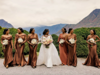 bride walks with bridesmaids in brown dresses at Lake Como