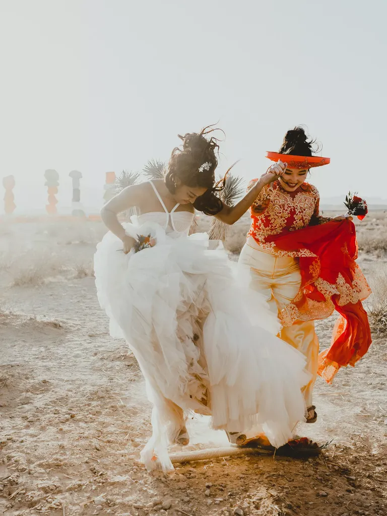 Couple Jumping the Broom During Desert Elopement in Las Vegas