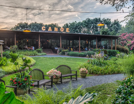 The sun sets on the tranquil setting of Canoe, where benches wait for visitors to stay awhile.