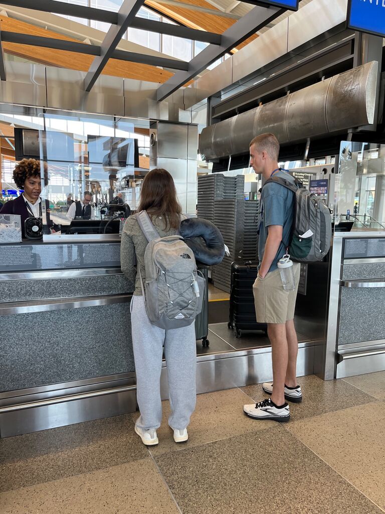 Caroline and Jordan's paths first crossed when they both decided to spend a summer interning for a missions organization in Hungary. Here they are at RDU Airport to catch their flight. 