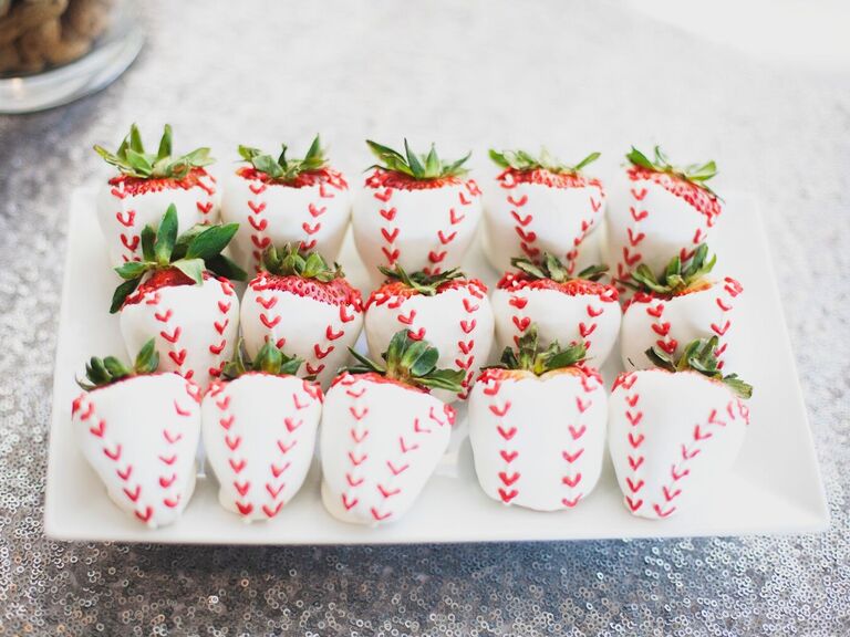 White-chocolate dipped strawberries with baseball stitching. 