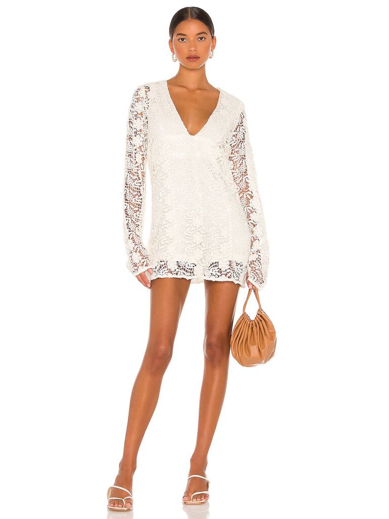 free people white bridal romper with v-neckline lace long sleeves and allover lace chest and shorts