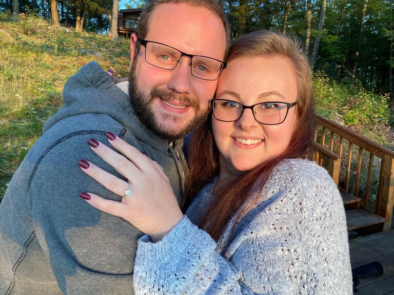 And as soon as we arrived at the cottage, we got engaged standing on the dock, looking out over the beautiful lake.