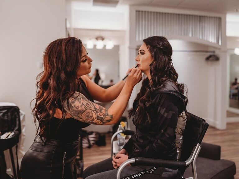 Makeup artist working their magic on a client