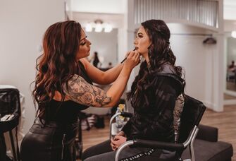 Makeup artist working their magic on a client