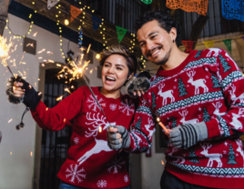 Couple with sparklers on Christmas