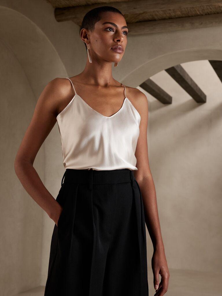 A semi-fitted silk charmeuse camisole in creamy white from Banana Republic