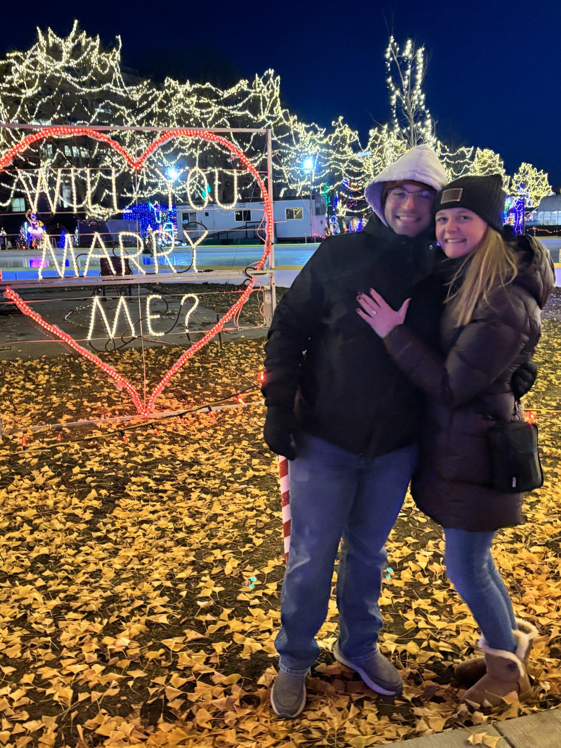 Ryan proposes to Simone at Rotary Lights in La Crosse, Wisconsin.