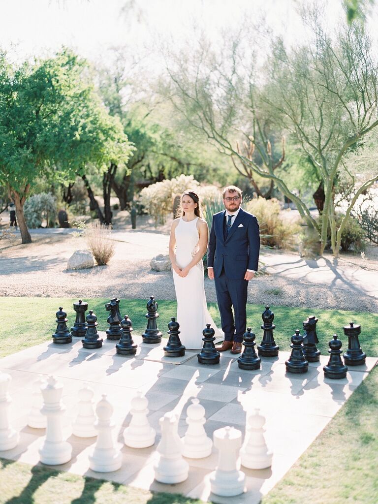 Bride and groom with giant chess board