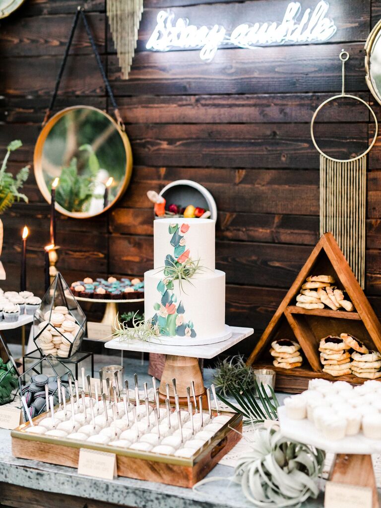 Geometric dessert table at backyard wedding