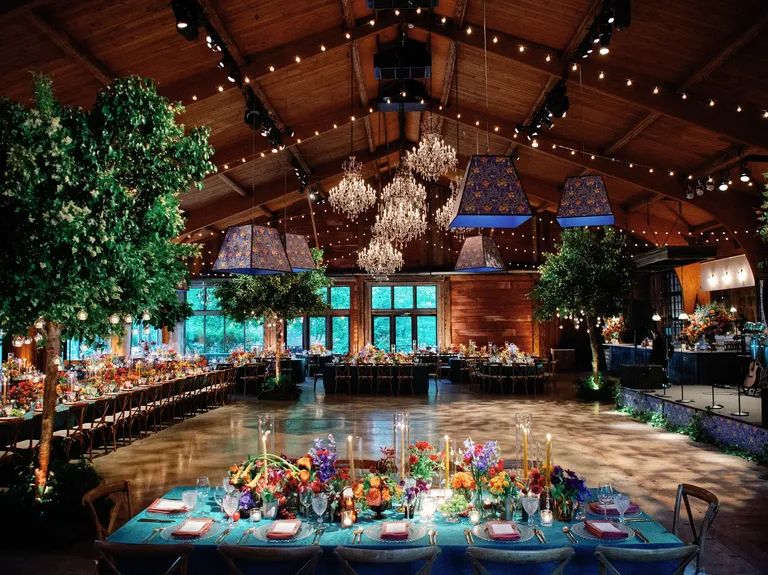 Jewel-tone reception decor, taylor swift themed wedding