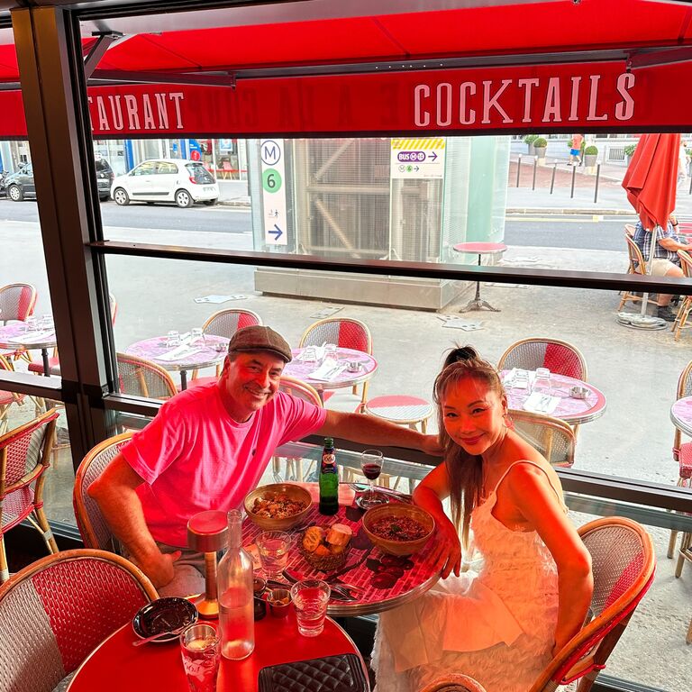 We traveled in Europe to explore London and Paris.  There are so many places and things to do together on our bucket list.  We will not be tired of traveling around the exotic places together. Here we are having simple fun eating "Escargot" in Paris.