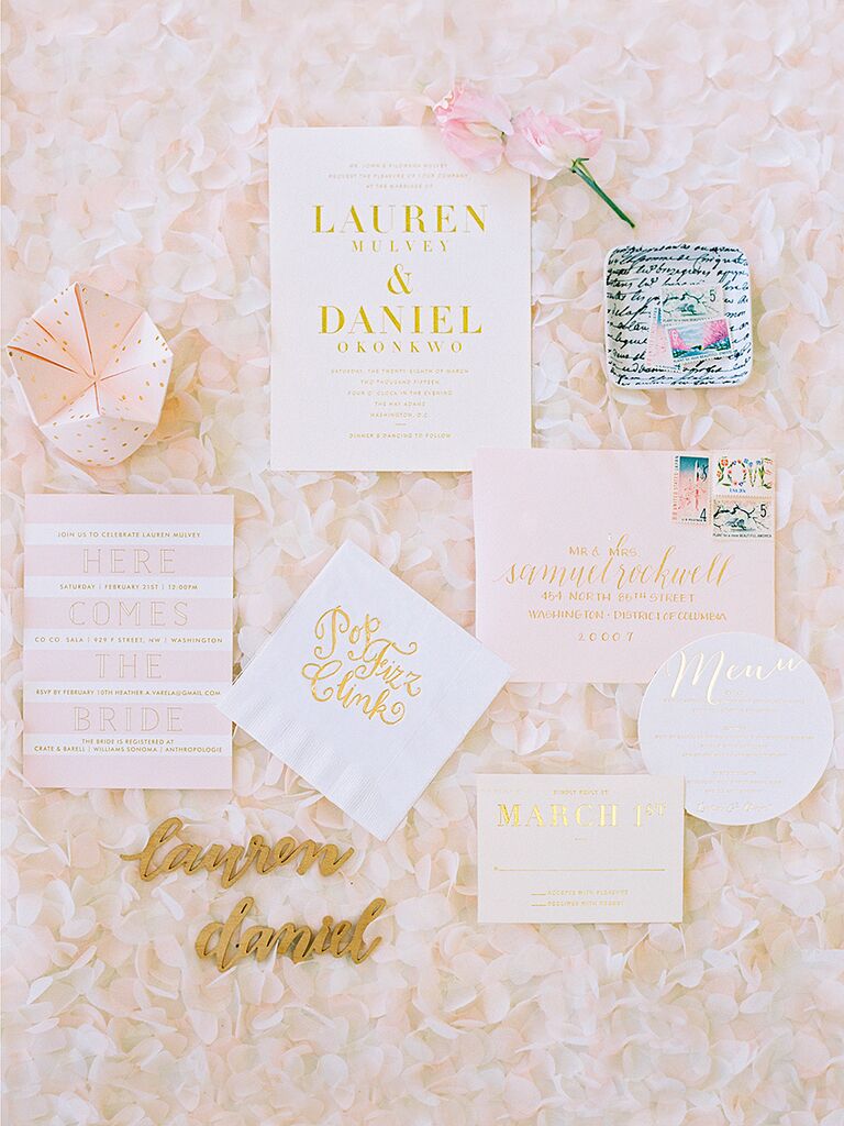 Blush and gold wedding invitations with a cootie catcher