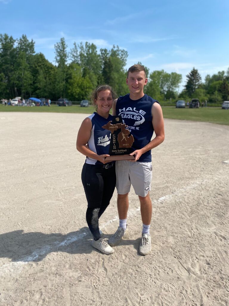 Claudia's Senior year, after winning the first softball district championship in school history!