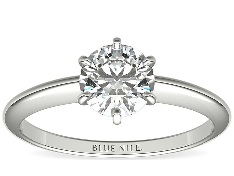 classic solitaire engagement ring with slim platinum band