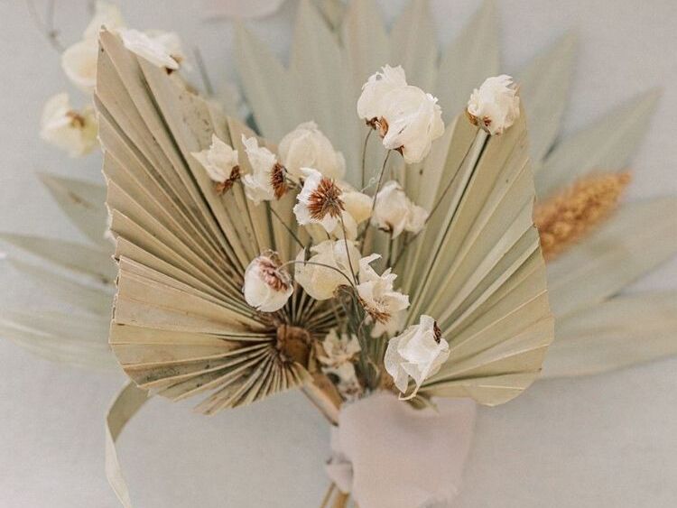 Boutonniere with dried palm leaf