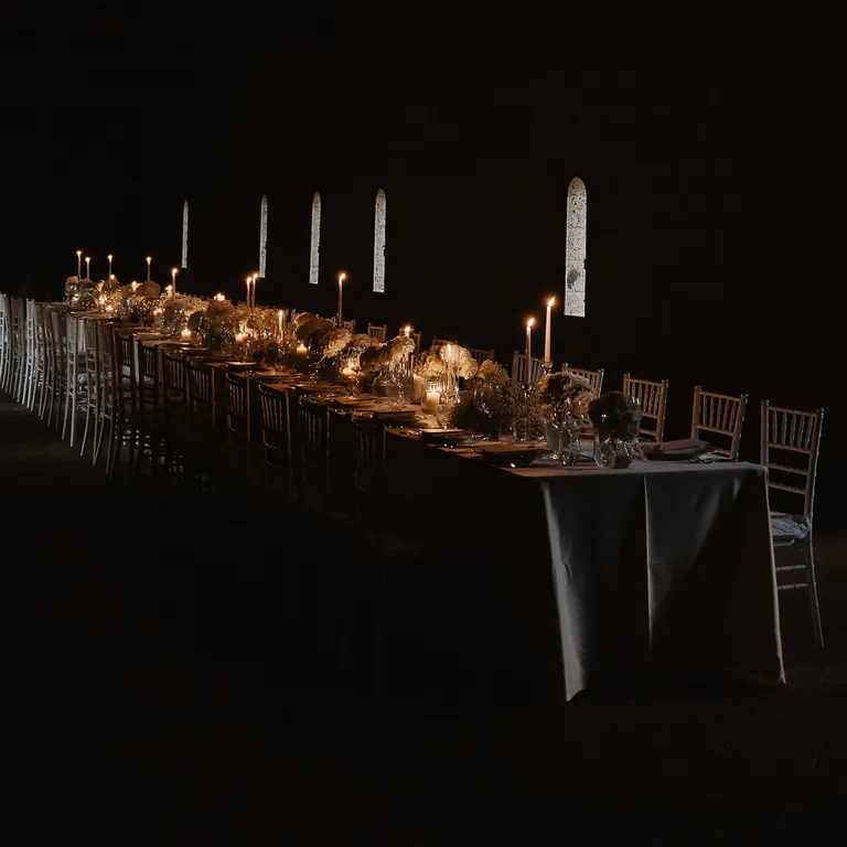 Intimate reception dinner with candlelight, taylor swift themed wedding