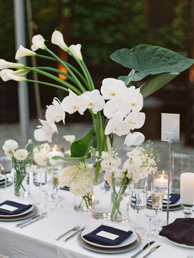 Modern tablescape with calla lilies and orchids