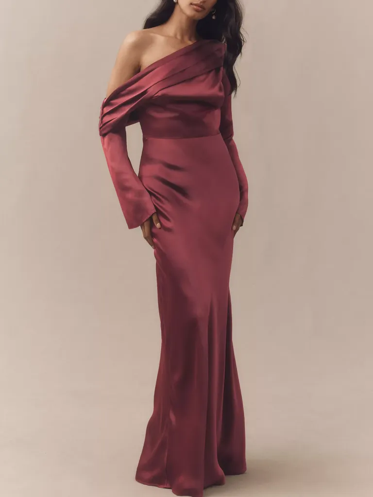 Burgundy asymmetrical off the shoulder wedding guest dress winter from Anthropologie