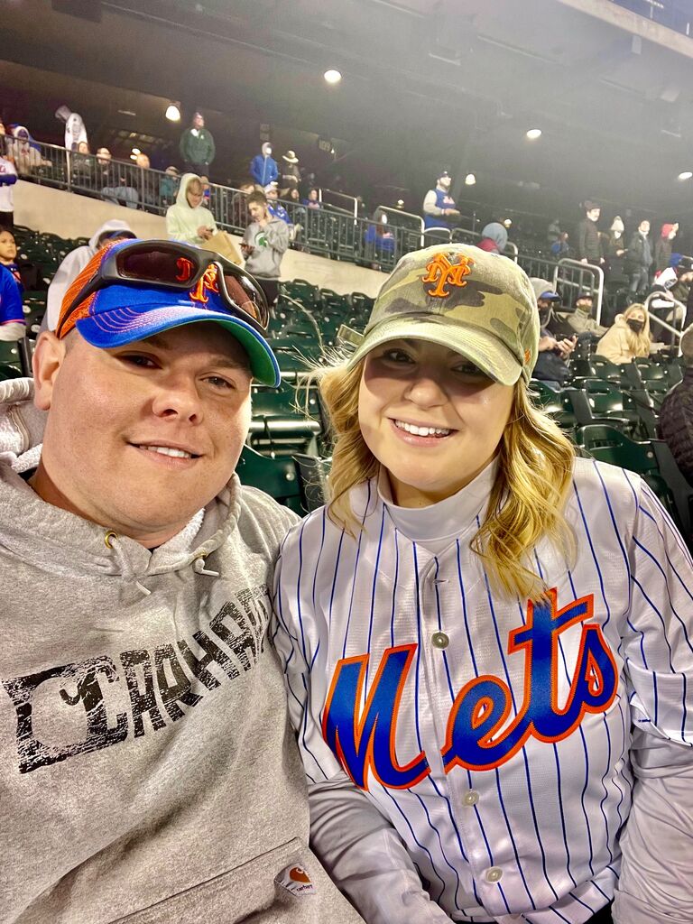 Tom decided that he could be an honorary New York Met's fan by asking Stephanie to be his girlfriend. 