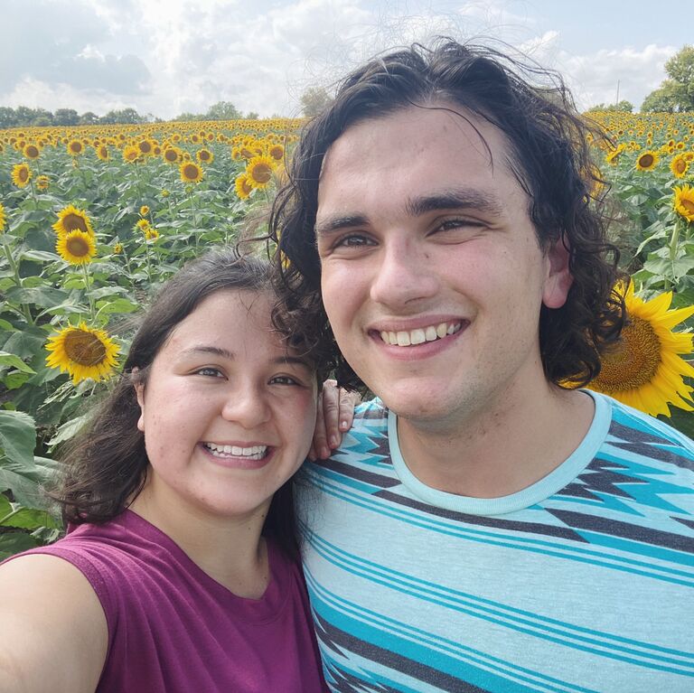 Tony surprised Josie with a trip to Lawrence, Kansas to see a field of sunflowers in bloom.