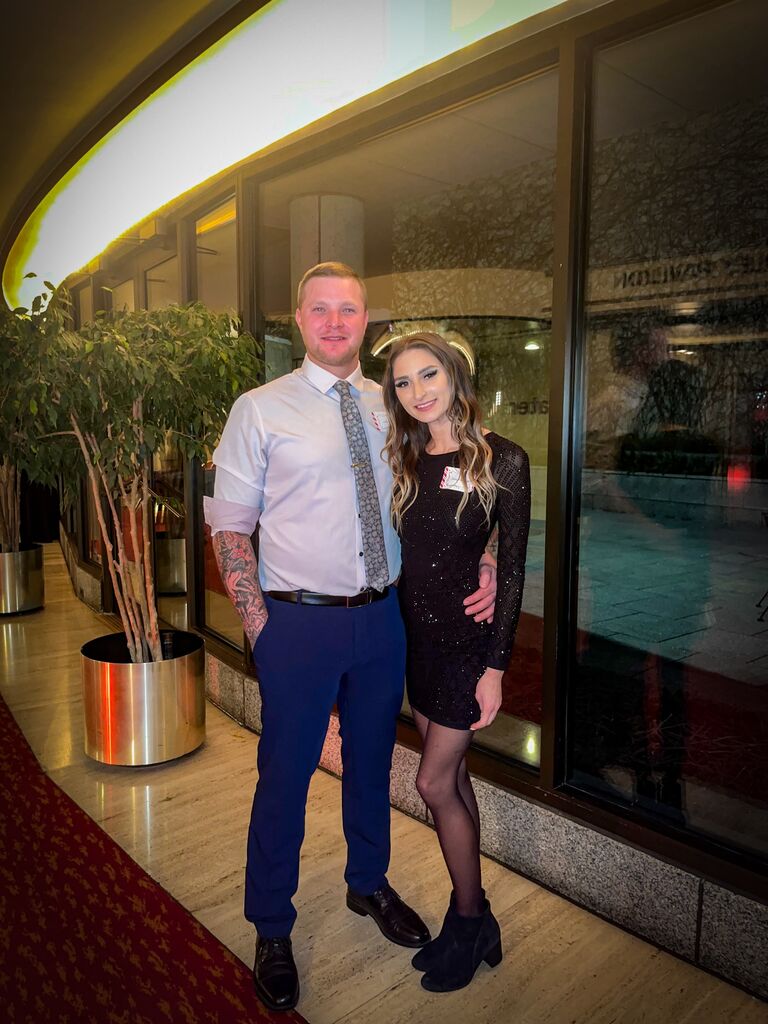 Lukas's second time attending Katie's company holiday party.