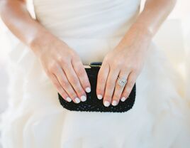 Bride holding a clutch