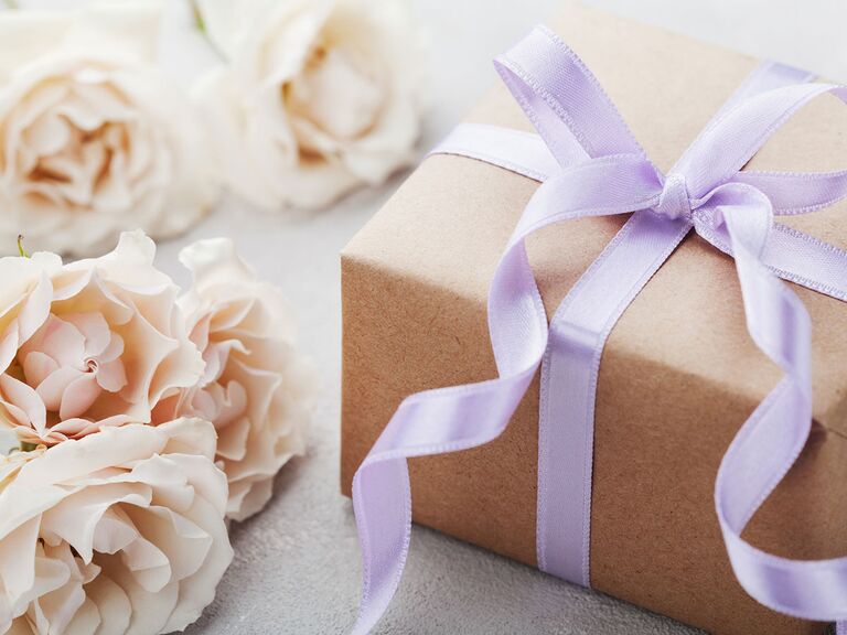 Simple gift box with purple ribbon
