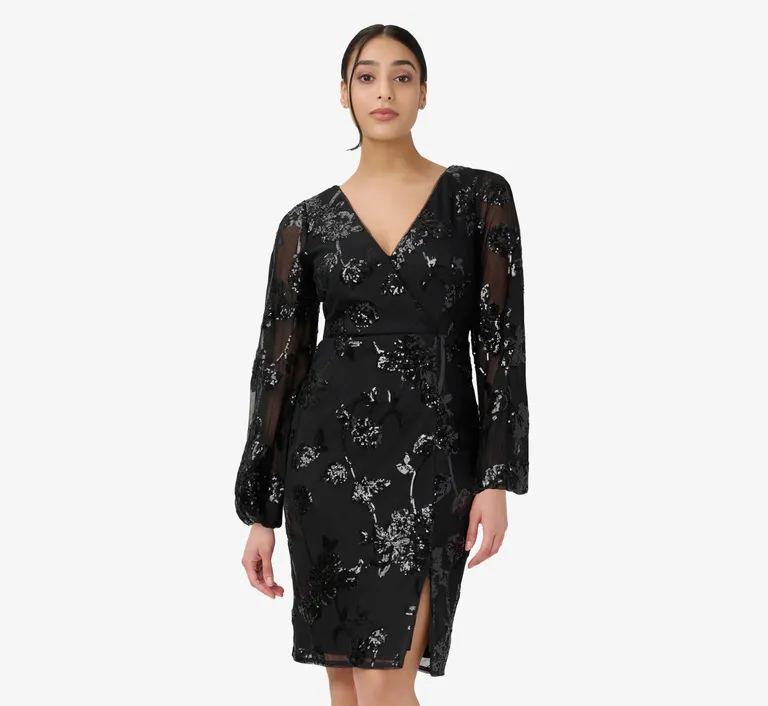 Streamlined dress with beaded floral pattern and long sleeves