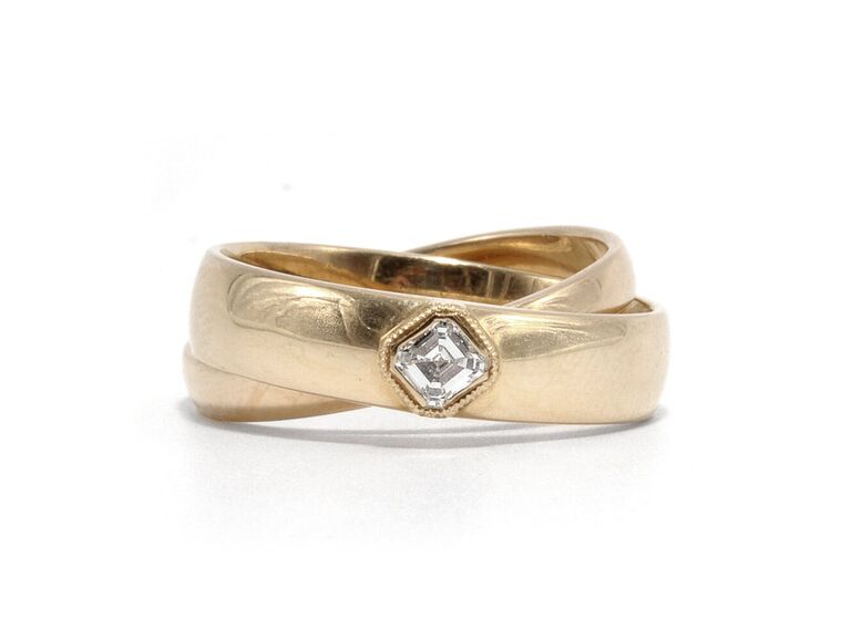 ashley zhang jewlery asscher cut engagement ring with diamond center stone and thick plain yellow gold twisted band and milgrain detailing