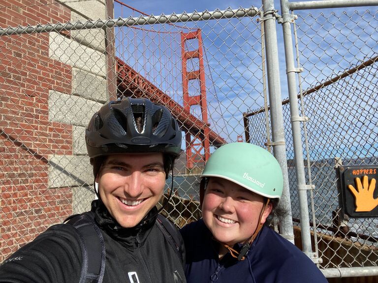 Joe and Tori bike to the base of the Golden Gate Bridge.