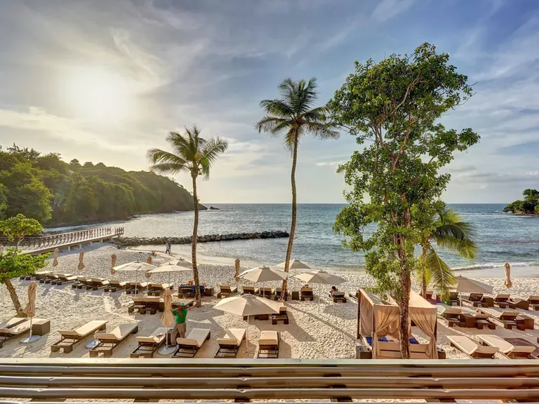 View of beach and lounge chairs at Royalton Saint Lucia, An Autograph Collection All-Inclusive Resort in St. Lucia