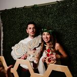 couple in wedding photo booth