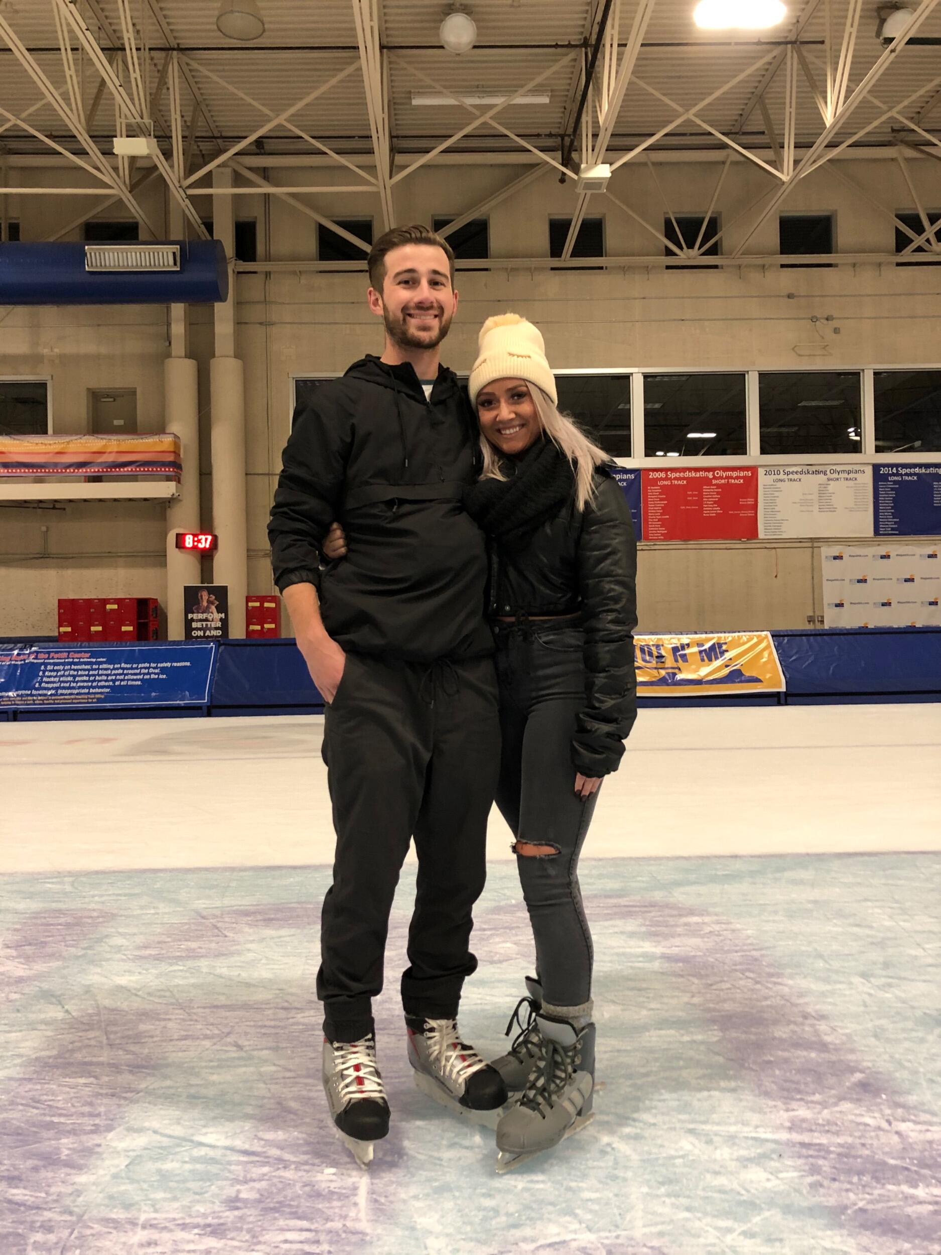 Luke trying to teach Dani how to ice skate!
