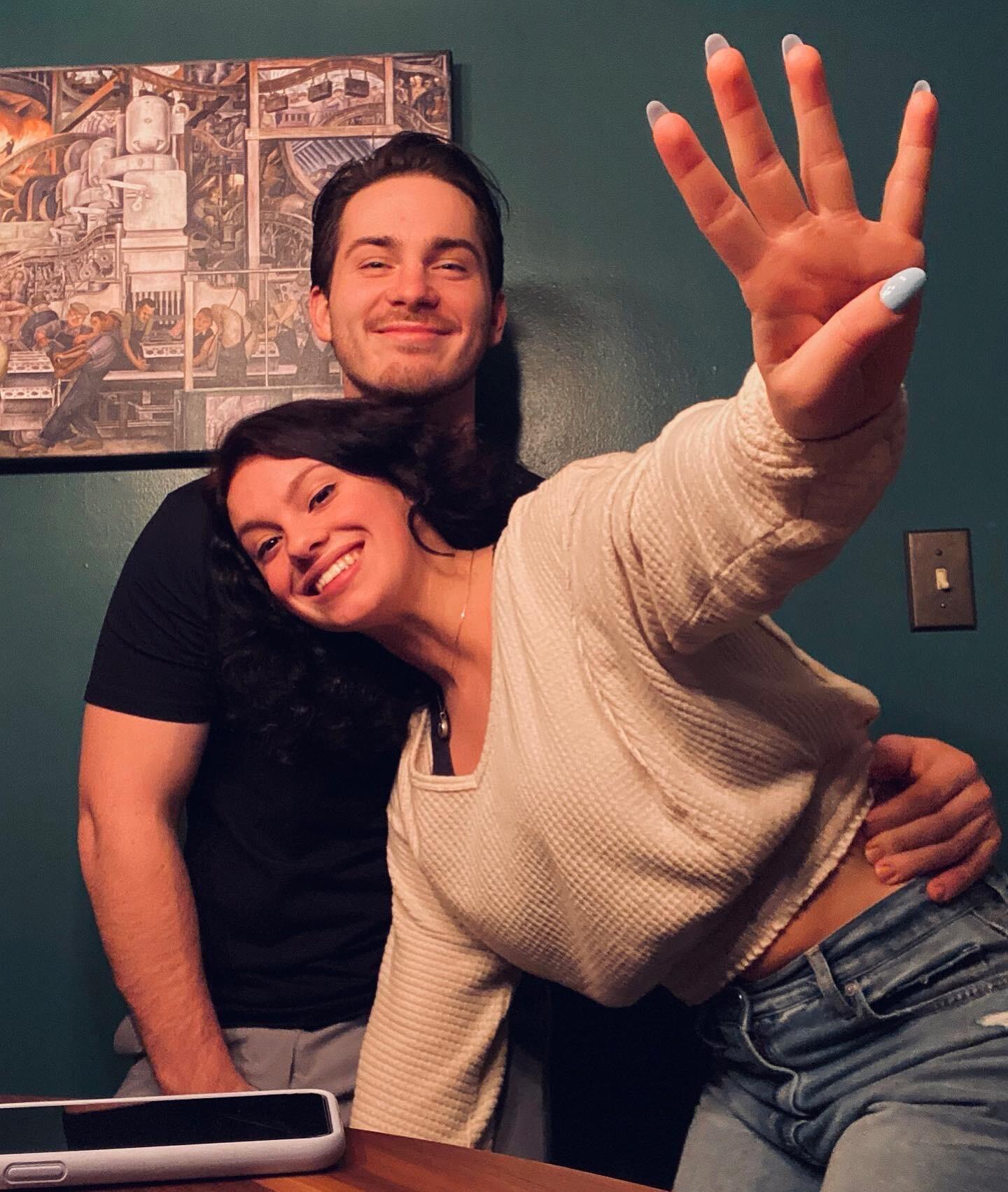 Spent their 4th anniversary at home, watching the ball drop and remembering that one year ago they had been celebrating while squished between hundred's of thousands of people in NYC. 