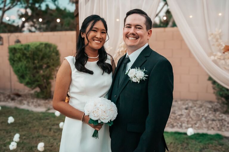 Our first wedding haha. We eloped right in our backyard! We wanted to legally be married as soon as possible due to the home purchase.

Đám cưới đầu tiên của chúng tôi haha. Chúng tôi bỏ trốn ngay ở sân sau của chúng tôi! Chúng tôi muốn kết hôn hợp pháp càng sớm càng tốt do việc mua nhà.