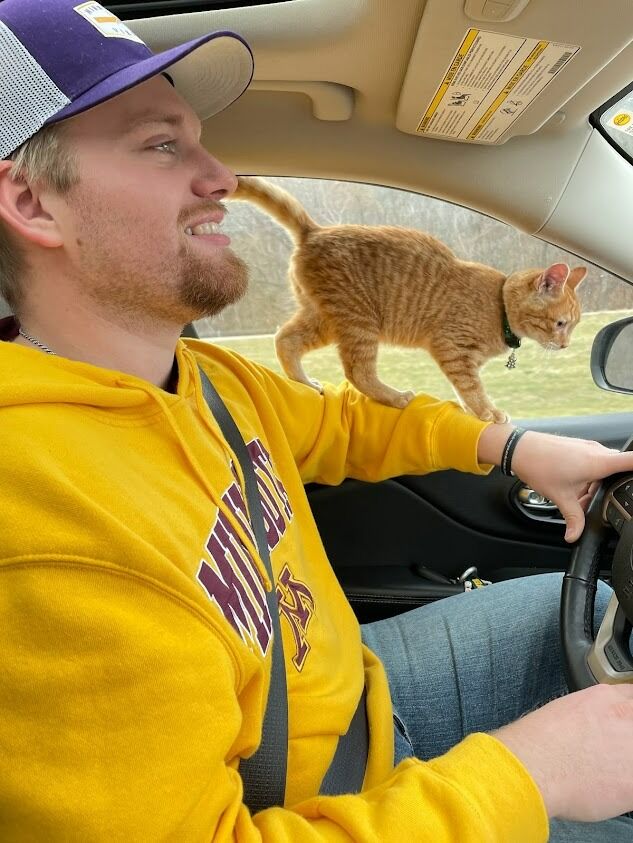 Ben convinced Gabbie to get a cat (Captain) despite her allergies.