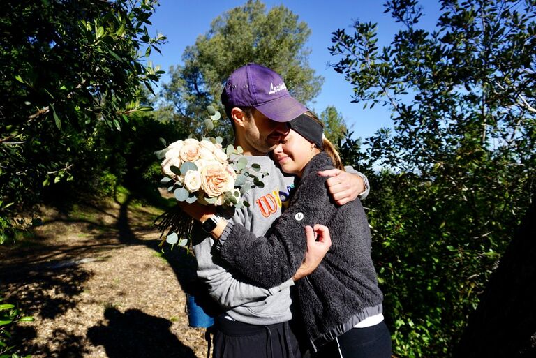 On April Fools Day Chuck asked Sydney to marry him. Here is the story for those of you who don't know!:
 Every weekend Chuck would wake Sydney up and take her on the same hike. She didn't particularly like doing the hike but he always encouraged her to do it by playing her favorite songs while they were hiking.  One of the songs Sydney lovedddd to sing along to was 'Tie a Yellow Ribbon Round the Ole Oak Tree'. Sydney always thought it was a song about a dude that had been in prison- but apparently its about a dude that had been at war! Anyway, during their hike Sydney saw a big beautiful yellow ribbon tied around a gorgeous tree. She GASPED! Sydney couldn't believe it! "How funny!" She thought!  Chuck realized that Syd was not getting it and said " Syd, its happening!" and Sydney blacked out and does not remember the rest! 
