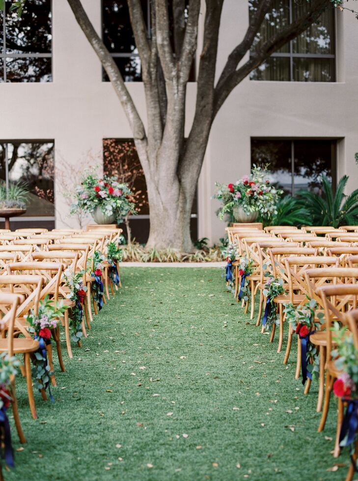 Outdoor Four Seasons Hotel Austin Wedding Ceremony With Cross Back