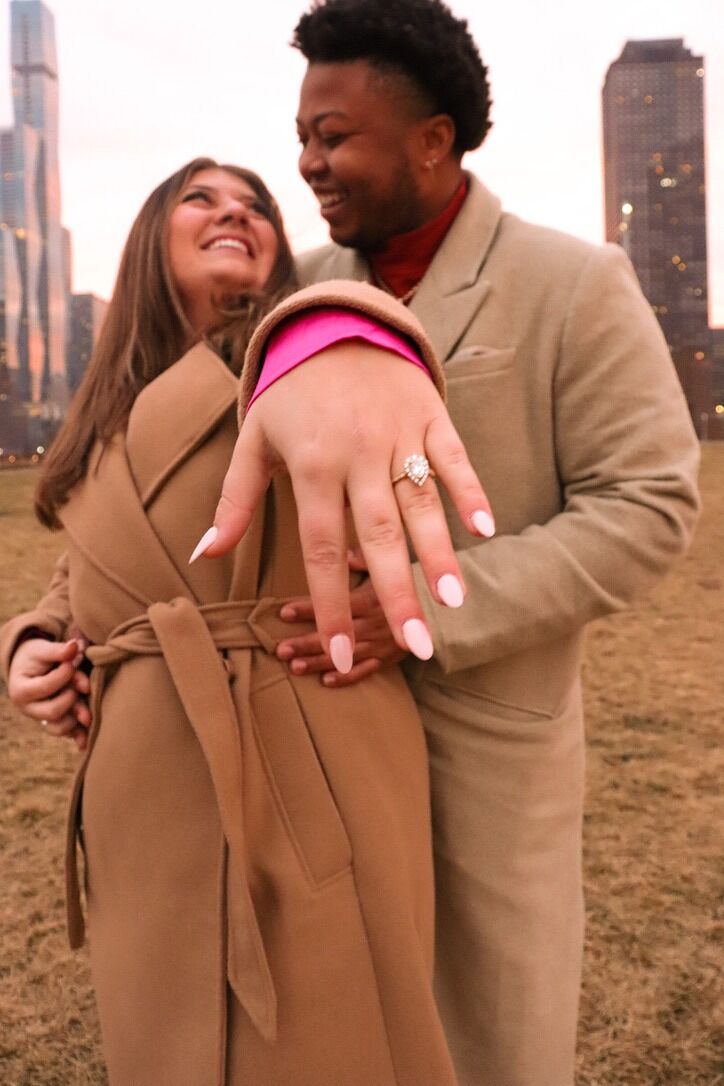 Matthew popped the question during the prettiest sunset while visiting Chicago with two of our close friends. 