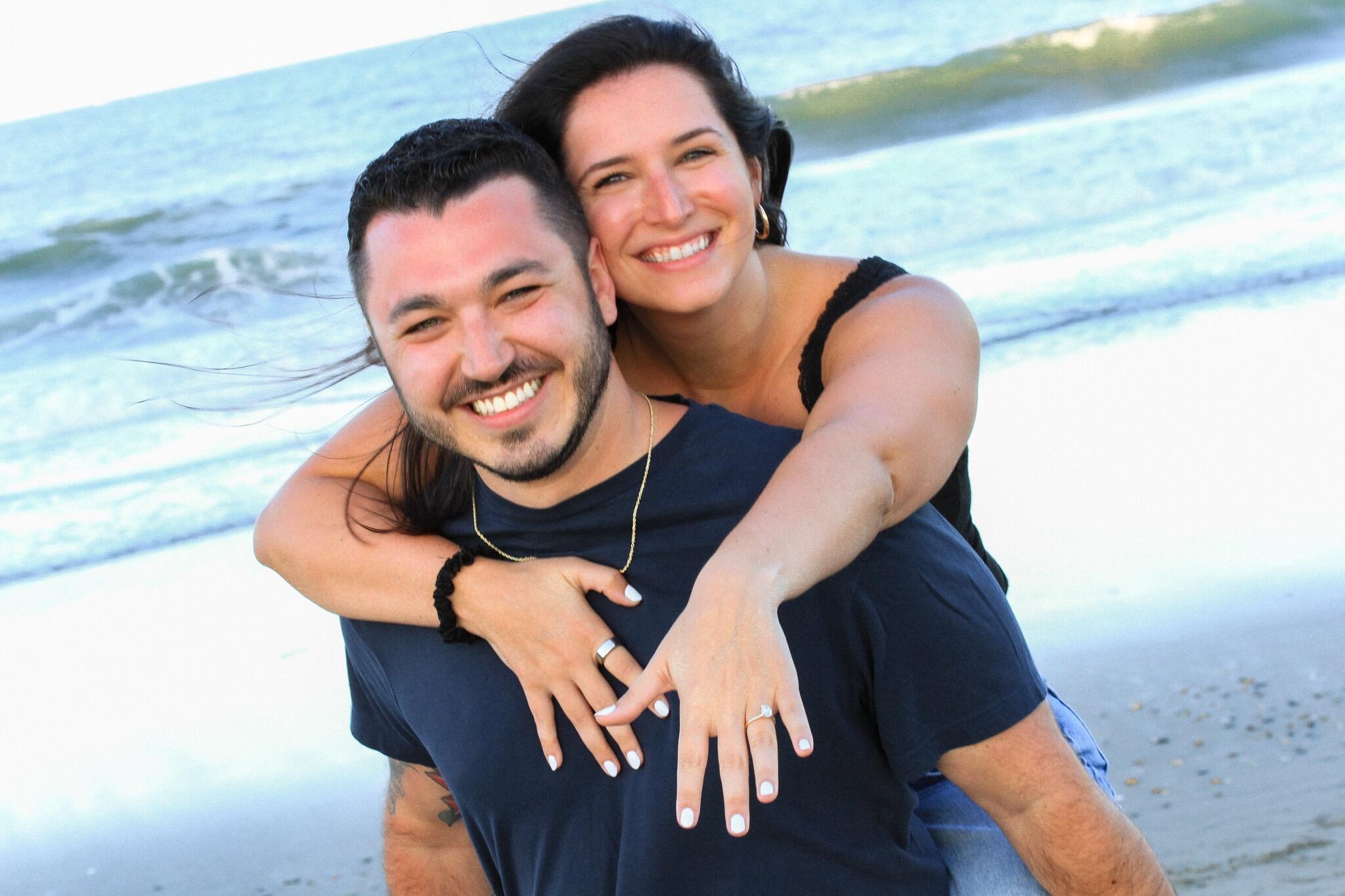 Rehoboth Beach, DE  |  Michael proposed to Madison!!! Michael was nervous to propose this day. His brother, Matt, said he needed to take some photos for school. Michael and Madison said they would go with him. Little did Madison know it was actually for Matt to capture the special moment! 