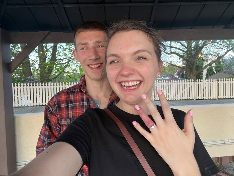 The couple’s relationship took the next step when Jason proposed to Emily on May 1st, 2024. Emily was so excited, she shoved the beautiful diamond ring onto her finger without a second thought. Twenty to thirty seconds later a color resembling a tomato took form in the skin surrounding her now engagement ring. After exhausting every trick in the book.. (yes, they tried floss) the couple resigned themselves to the fact that there are no take backs in real life.